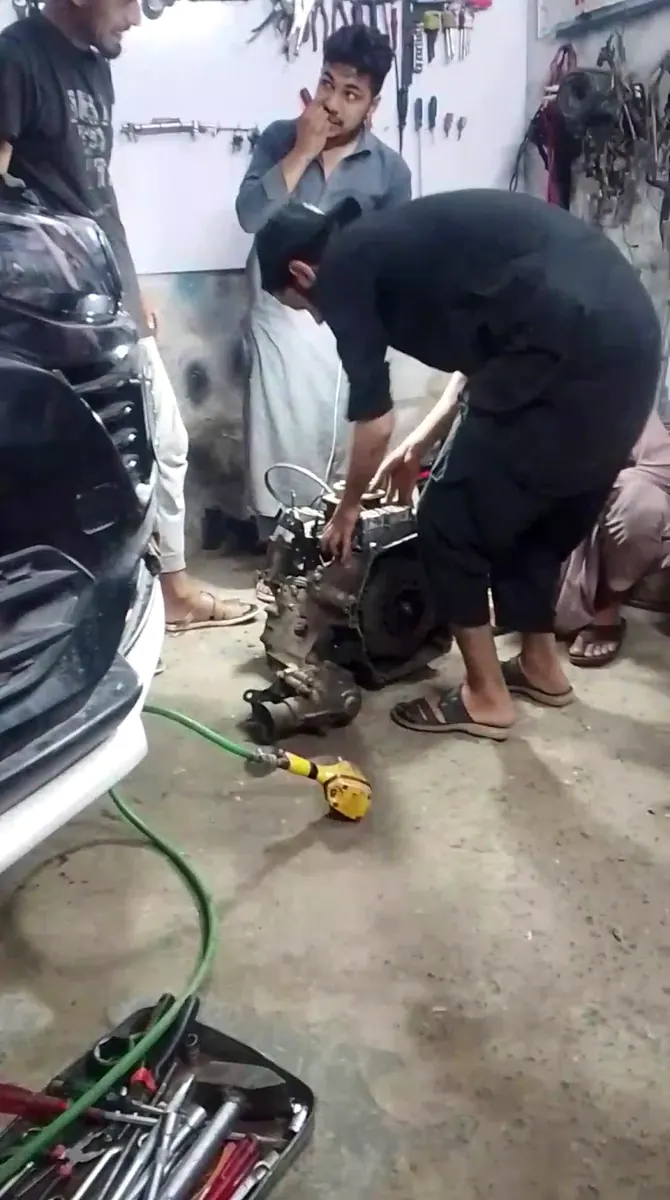 Mechanic working on an engine